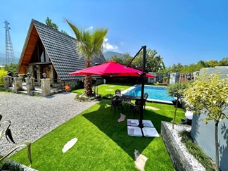 اجاره کلبه سنگی در رامسر با استخر