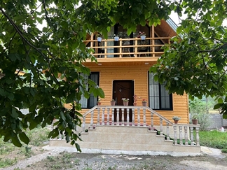 اجاره کلبه چوبی جنگلی شاندرمن