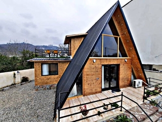 کلبه چوبی با جکوزی در رامسر