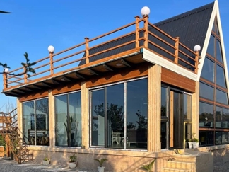 کلبه چوبی با جکوزی در نور مازندران