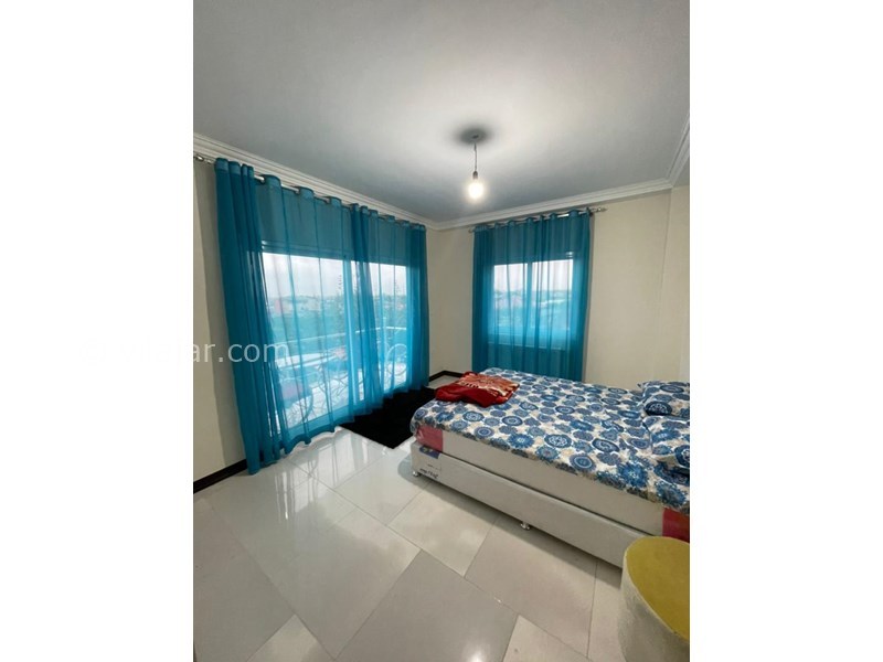 عکس شماره 701375 - اجاره ویلا در چالوس - اتاق خواب همراه کمد دیواری و تخت و تراس