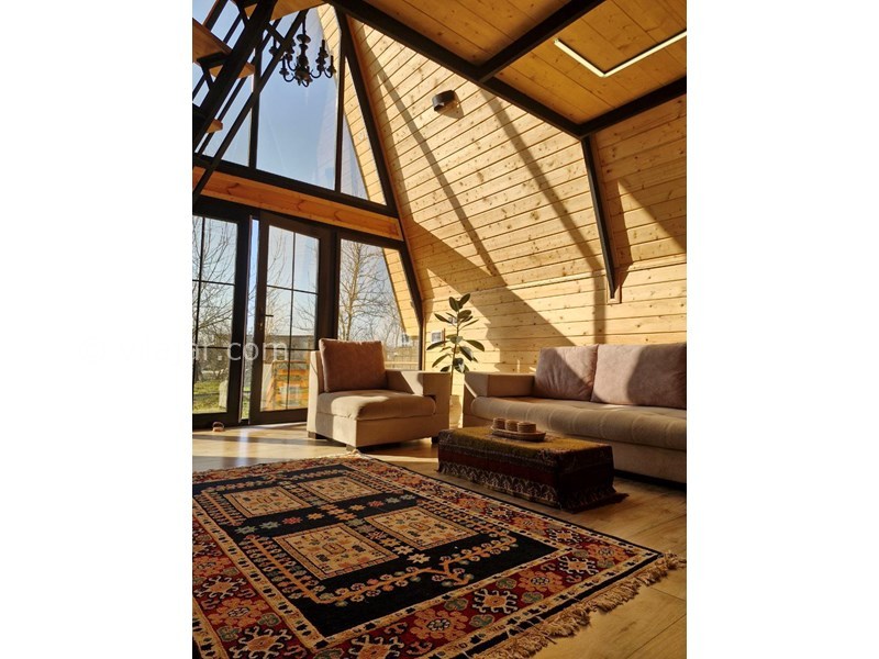 عکس شماره 852640 - اجاره کلبه چوبی در رضوانشهر گیلان - نشیمن نورگیر کلبه بمانی