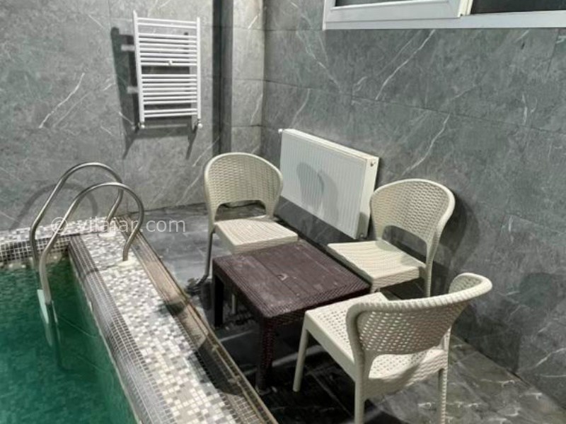 عکس شماره 881515 - اجاره ویلا استخر دار متل قو - صندلی داخل استخر